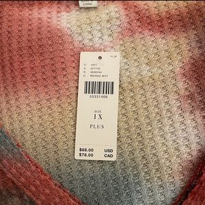 Multi  color peplum top from Anthropologie.  Size 1x new with tags